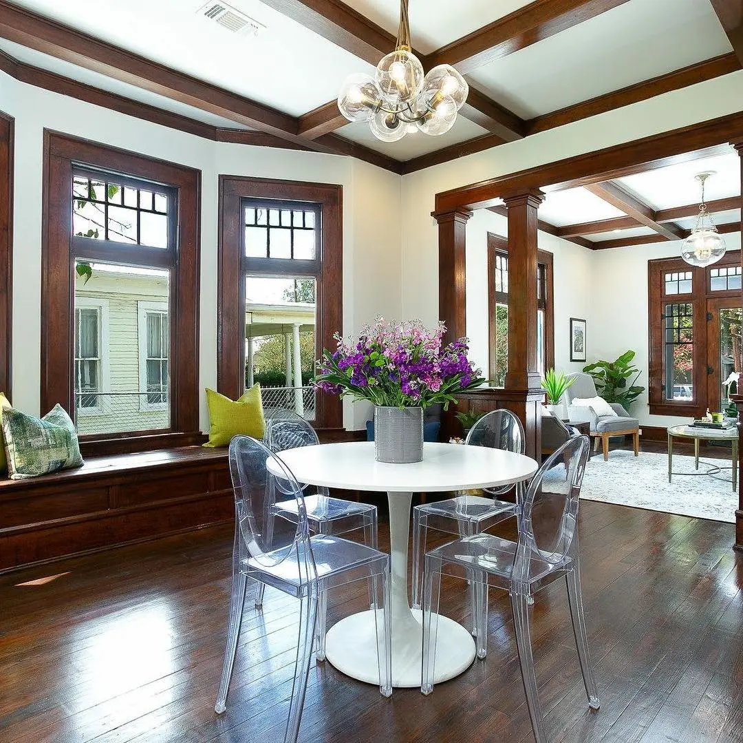 a dining room with a table and chairs