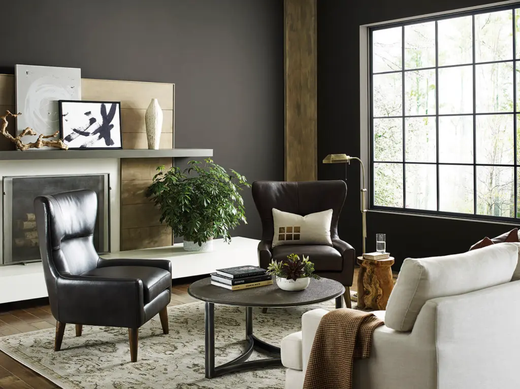 a living room with two chairs and a coffee table