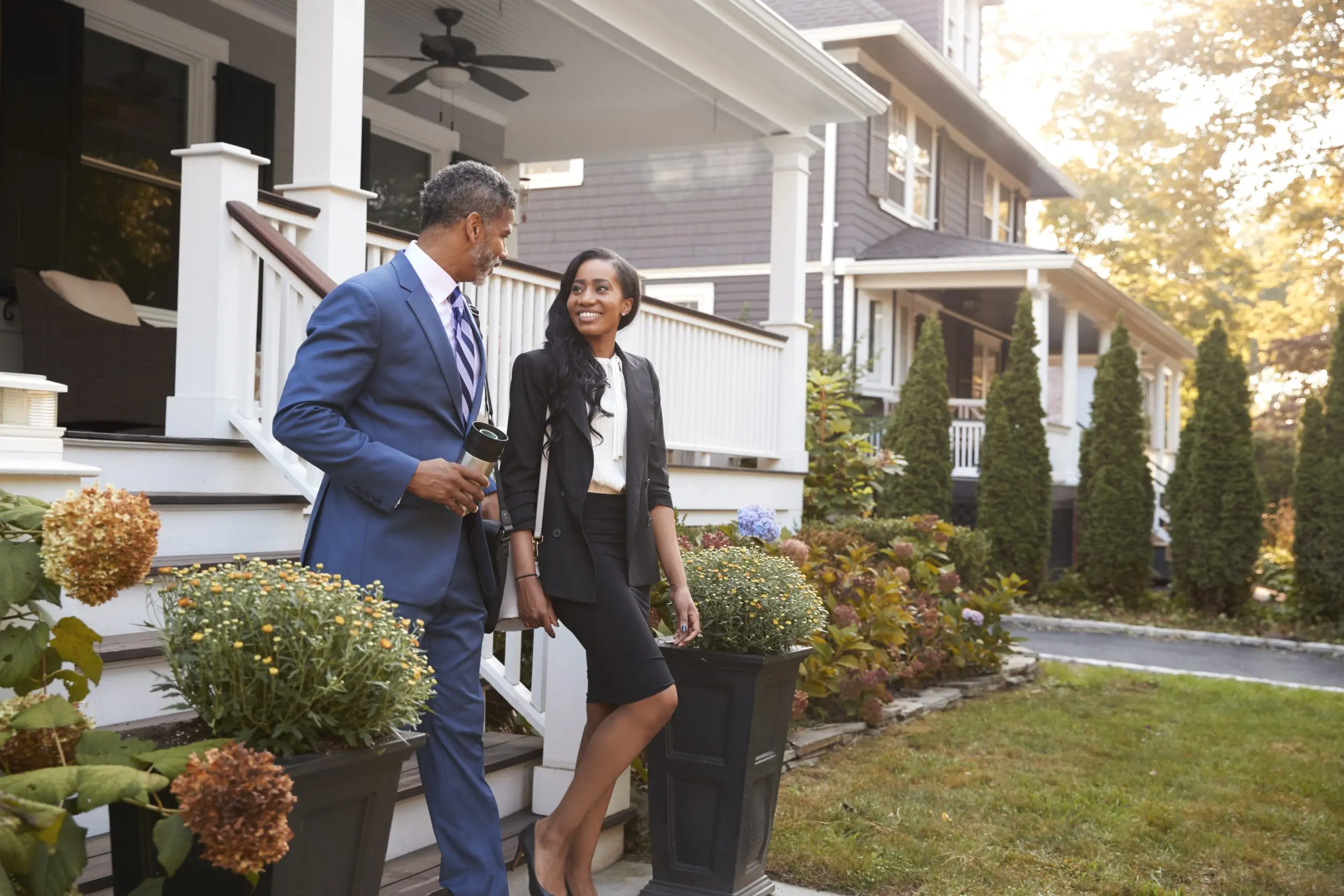 https://www.newwestern.com/wp-content/uploads/2024/03/business-couple-leaving-suburban-house-for-commute-2023-11-27-05-08-07-utc-scaled.jpg