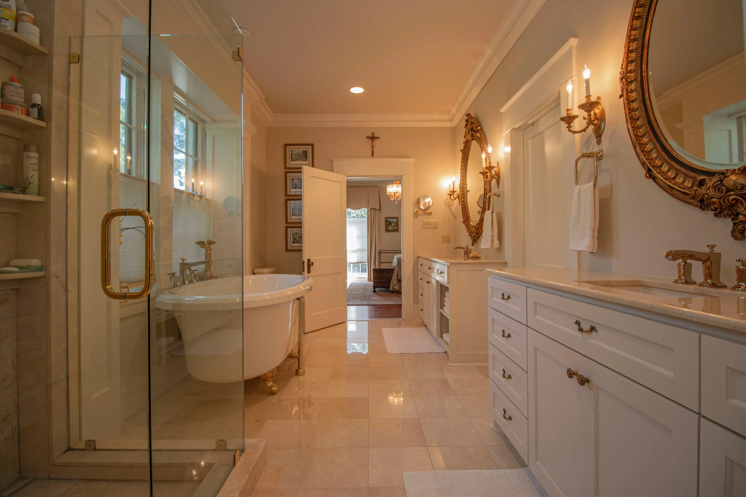 a bathroom with a claw foot tub and two sinks