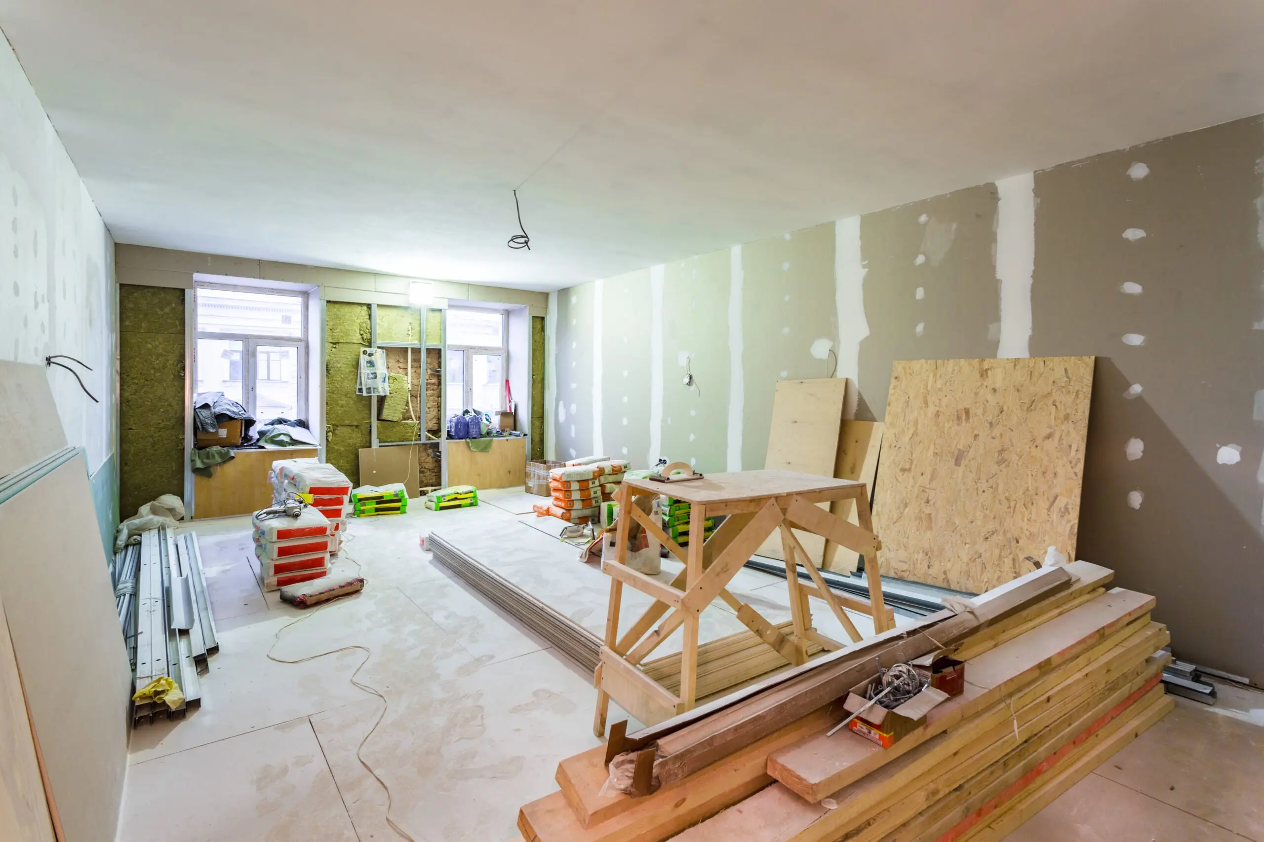 a room that is being remodeled with a bunch of supplies