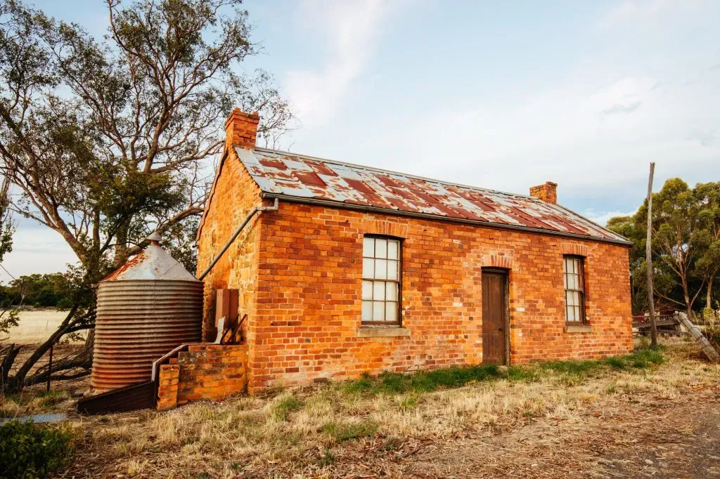 Brick home that needs considerable renovations